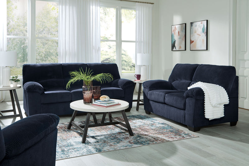Signature Design by Ashley SimpleJoy living room set with stationary sofas and loveseats, featuring plush cushions and modern style.