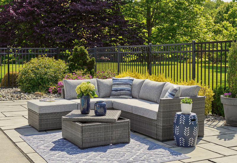 Petal Road - Loveseat Sectional, Ottoman, Table Set (Set of 4) - Gray - R&R Furniture Gallery (Fountain Valley, CA)