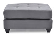 Contemporary upholstered ottoman by Glory Furniture featuring a sleek design and plush fabric, ideal for modern living spaces.