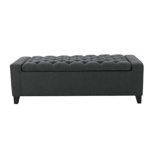 Dark gray Noble House storage ottoman with tufted top, showcasing a contemporary design and soft fabric upholstery.