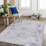 Maval - 6' X 9' Washable Area Rug - Gray / Gold - R&R Furniture Gallery (Fountain Valley, CA)