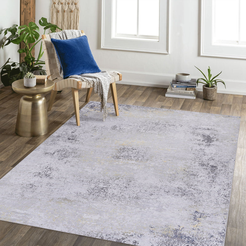 Maval - 8' X 10' Area Rug Washable - Gray / Gold - R&R Furniture Gallery (Fountain Valley, CA)