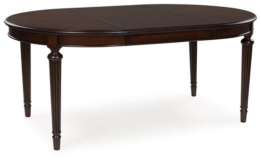 Lavinton - Oval Dining Room Extension Table - Brown - R&R Furniture Gallery (Fountain Valley, CA)