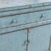 Classic Home Winford 3-drawer, 6-door buffet cabinet with wood finish and ample storage space.