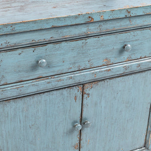 Classic Home Winford 3-drawer, 6-door buffet cabinet with wood finish and ample storage space.