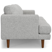 Livingston upholstered stationary sofa by Simpli-Home, featuring plush cushions and a modern design in neutral fabric.