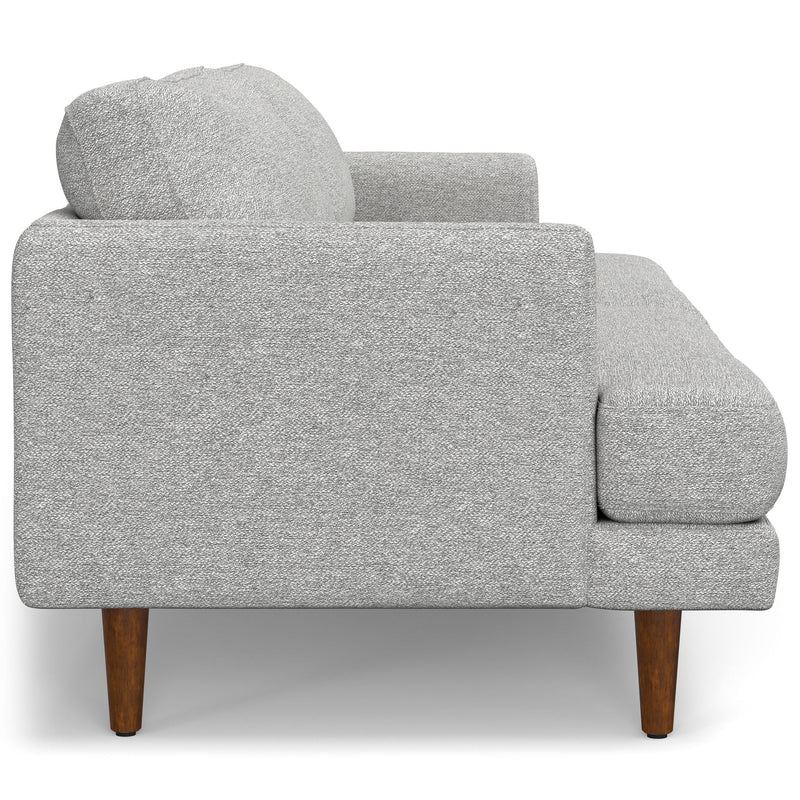 Livingston upholstered stationary sofa by Simpli-Home, featuring plush cushions and a modern design in neutral fabric.