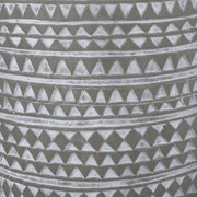 White outdoor side table with cylindrical shape by Noble House, perfect for patio or garden decor.