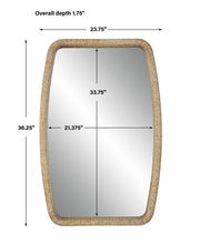 Uttermost gold Tiki accent mirror with a sleek, modern design reflecting light and adding style to any space.