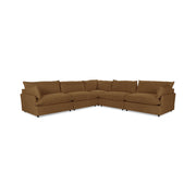 Classic Home Caplan modular sectional sofa with plush cushions and modern design, shown in a spacious living room setting.