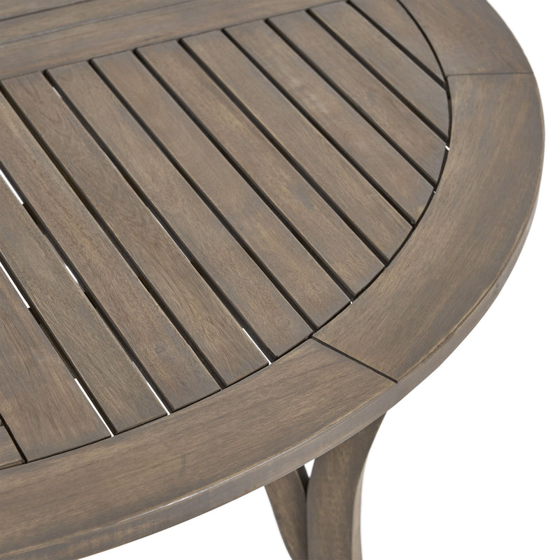 Noble House Hermosa outdoor acacia wood circular dining table with sturdy design and natural wood finish.