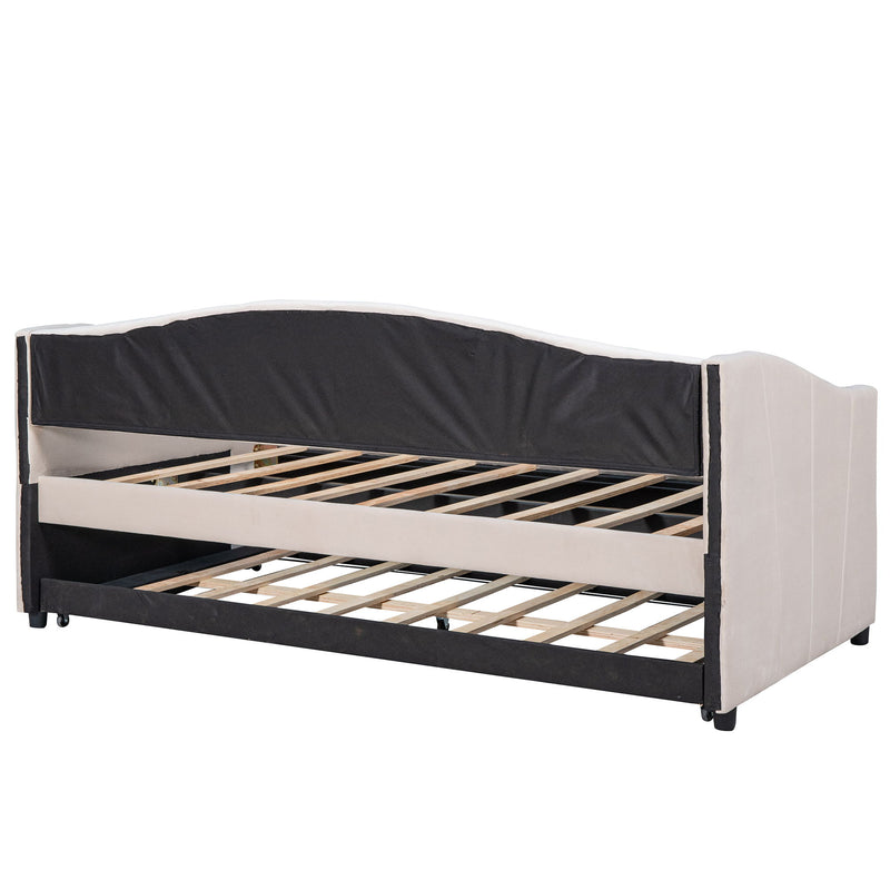 DreamHaus upholstered daybed sofa bed with trundle and wood slat base, showcasing plush fabric and versatile sleeping options.
