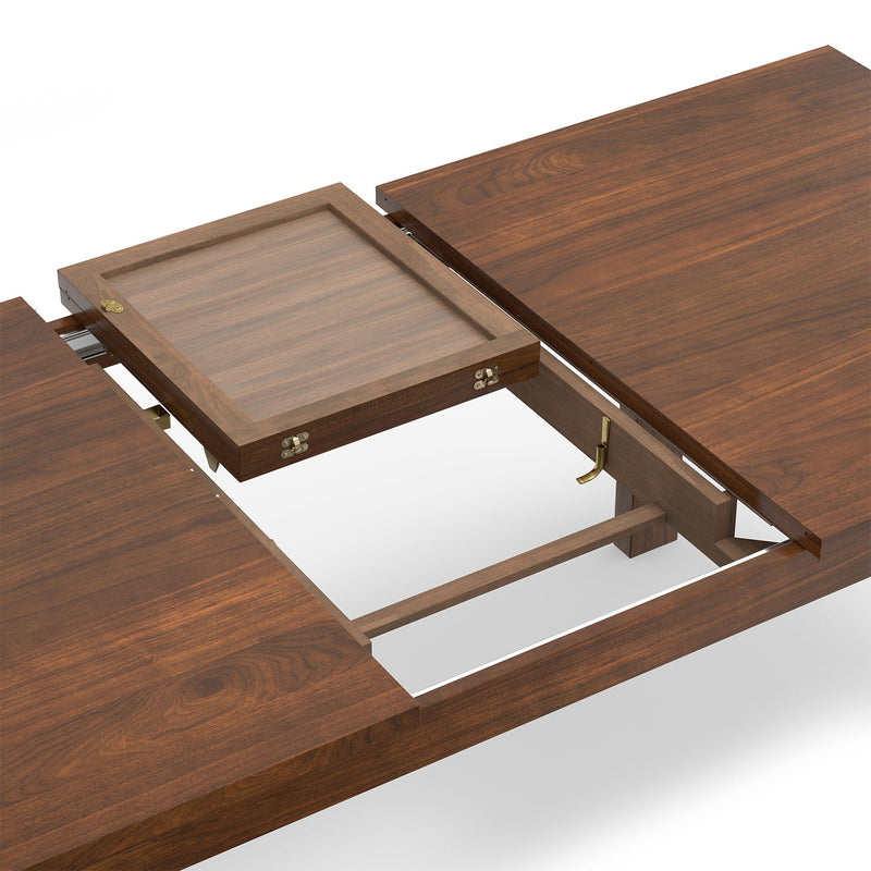 Wilson handcrafted dining table by Simpli-Home with wooden finish, shown with chairs in a modern dining room setting.