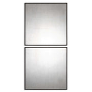 Set of two black antiqued square wall mirrors by Uttermost, featuring vintage-style frames with a textured, aged finish.