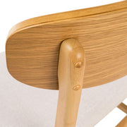 Set of two Noble House dining chairs with cushioned seats, featuring wooden legs and elegant design for kitchen or dining room.