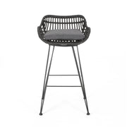 Outdoor rattan bar chair with metal legs from Noble House, stylish stool set for patio or outdoor entertaining.