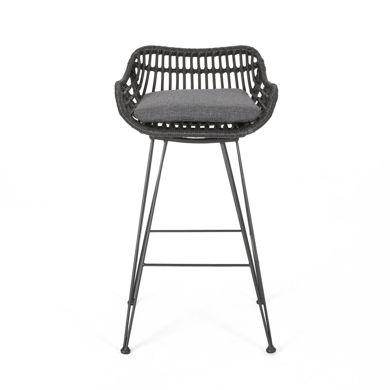 Outdoor rattan bar chair with metal legs from Noble House, stylish stool set for patio or outdoor entertaining.