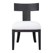 Uttermost Idris armless side chair with plush upholstery and wooden legs, showcasing modern design and neutral fabric.