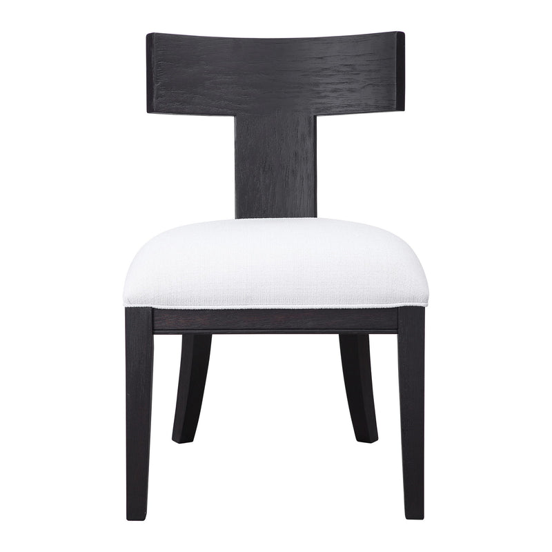 Uttermost Idris armless side chair with plush upholstery and wooden legs, showcasing modern design and neutral fabric.