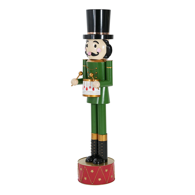 Noble House Christmas nutcracker holiday decor in green and red standing upright with festive details