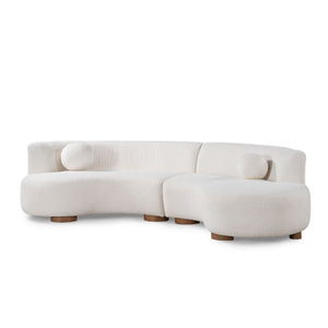 Classic Home Octavia stationary sectional sofa with plush cushions and modern design in a cozy living room setting.