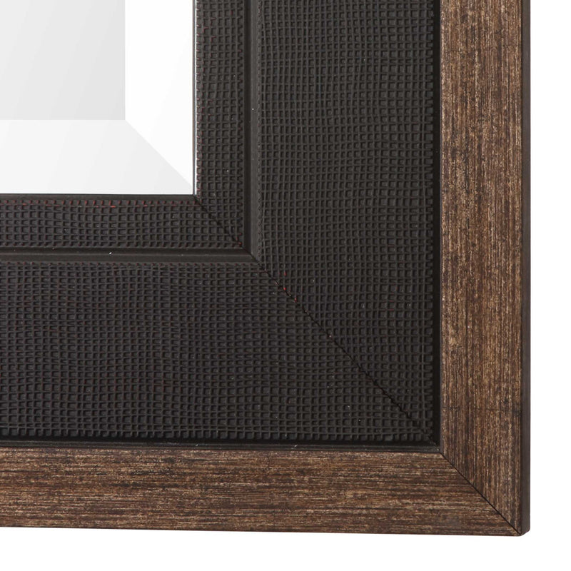 Uttermost Staveley rustic black wall mirror with a textured wooden frame, ideal for farmhouse or rustic decor.