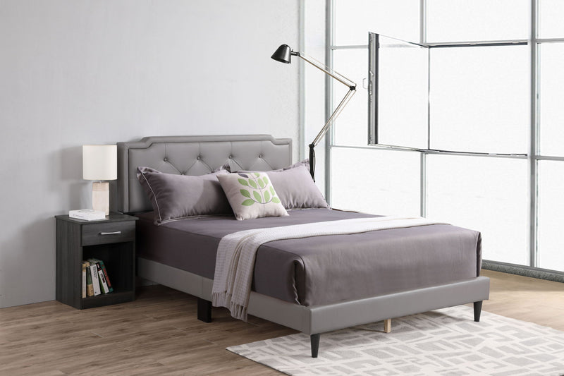 Button tufted upholstered bed by Glory Furniture featuring a cozy, elegant design with a padded headboard and plush fabric.