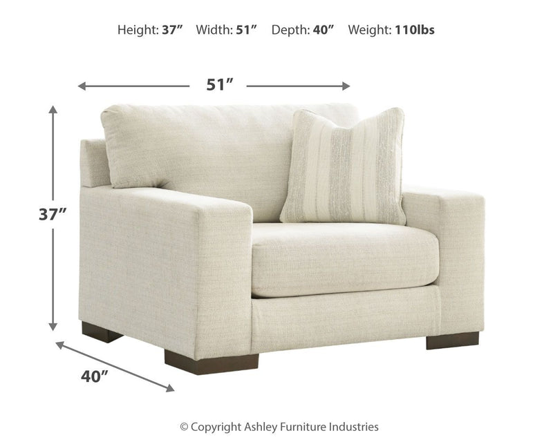 Signature Design by Ashley Maggie chair and a half arm chair with plush upholstery and wide seating for comfortable lounging.