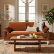 Jennifer Taylor Home Pasadena Modern Farmhouse Sofa in neutral fabric, showcasing plush cushions and wooden legs for a cozy living room look.