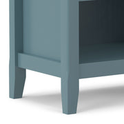 Handcrafted Amherst bedside table by Simpli-Home, featuring a wooden surface and storage drawer, ideal for bedroom decor.