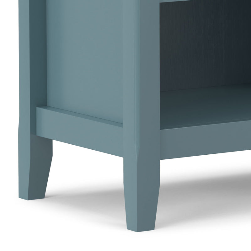 Handcrafted Amherst bedside table by Simpli-Home, featuring a wooden surface and storage drawer, ideal for bedroom decor.