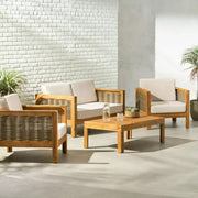 Outdoor 4 seater acacia wood chat set with wicker accents and beige cushions, ideal for patio relaxation by Noble House.