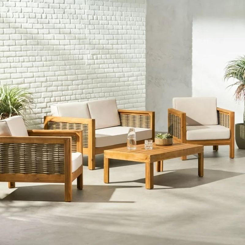 Outdoor 4 seater acacia wood chat set with wicker accents and beige cushions, ideal for patio relaxation by Noble House.