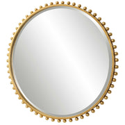 Round iron wall mirror by Uttermost with a sleek, minimalist frame reflecting light and adding modern style to interior spaces