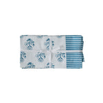 Set of four TOV Furniture Crissy cotton canvas printed napkins featuring blue vintage floral design.