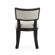 Noble House farmhouse style fabric upholstered side dining chairs set with cushioned seats and wooden legs.