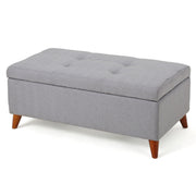Light gray upholstered storage ottoman with button-tufted seat and lift-top, featuring a soft fabric finish from Noble House.