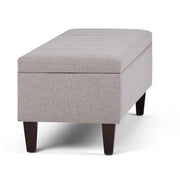 Simpli-Home Monroe upholstered storage ottoman with cushioned top and spacious interior for versatile living room storage.