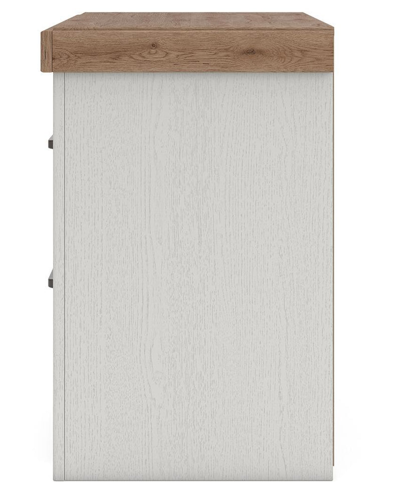 Benchcraft® white and brown two-drawer nightstand with built-in charging station and modern design.