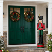 Green and red Noble House classic nutcracker holiday decor, detailed Christmas figure with festive attire.