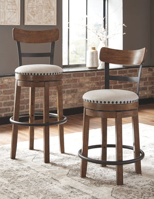 Valebeck - Tall Upholstered Swivel Barstool - R&R Furniture Gallery (Fountain Valley, CA)