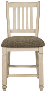 Set of two beige upholstered barstools by Signature Design by Ashley, featuring padded seats and wooden legs for comfortable seating.