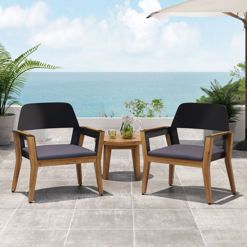 Set of two Noble House Soho outdoor club chairs with teak frames and cushions, perfect for stylish outdoor seating.