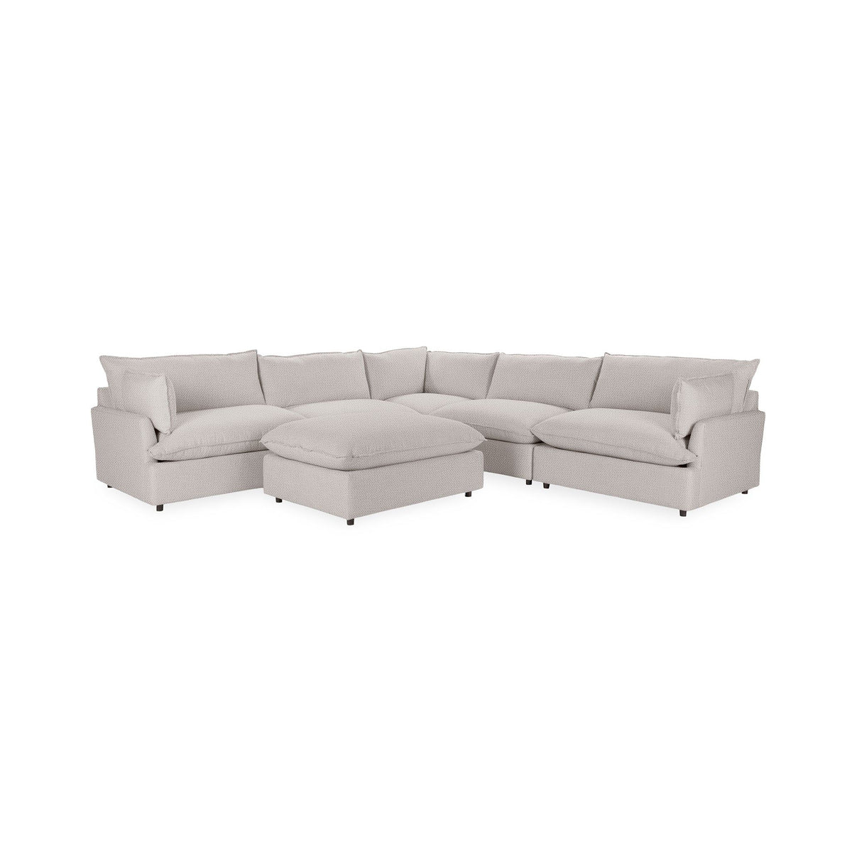 Classic Home Caplan 6-piece modular sectional with ottoman, featuring plush cushions and modern design for a stylish living room.