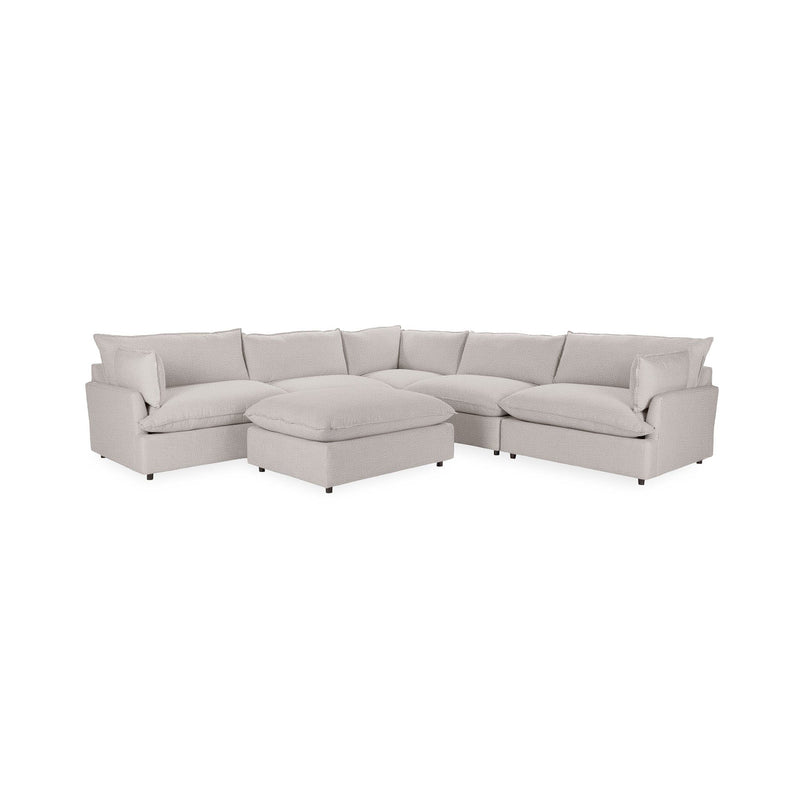 Classic Home Caplan 6-piece modular sectional with ottoman, featuring plush cushions and modern design for a stylish living room.