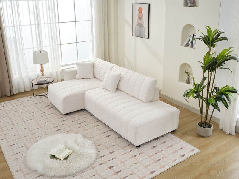 Urban Retreats Jessica lamb wool sectional sofa with chaise, versatile stationary sectional in soft, plush fabric, modern living room style.