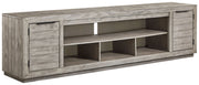 Naydell - XL TV Stand w/Fireplace Option - Gray - R&R Furniture Gallery (Fountain Valley, CA)
