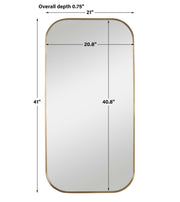 Uttermost Taft wall mirror with a sleek, modern frame, hanging on a wall, showcasing contemporary home decor.