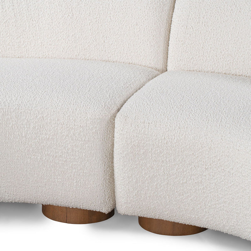 Classic Home Octavia stationary sectional sofa with plush fabric, featuring multiple seating sections and a modern design.