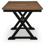 Signature Design by Ashley Wildenauer dining room extension counter table with a wooden finish, showcasing its sleek, versatile design.